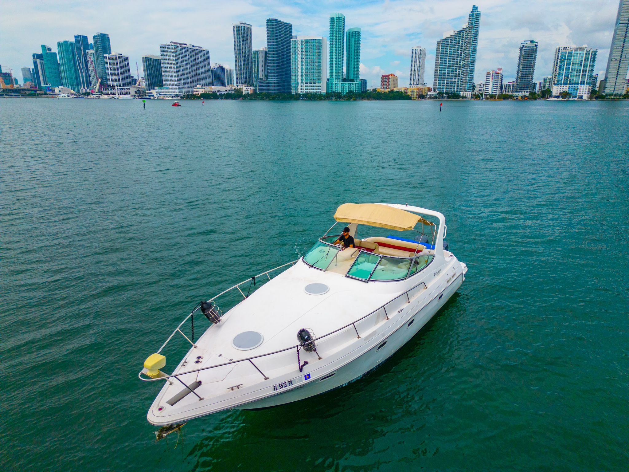 Cruiser 37 gliding on Biscayne Bay with Miami skyline
