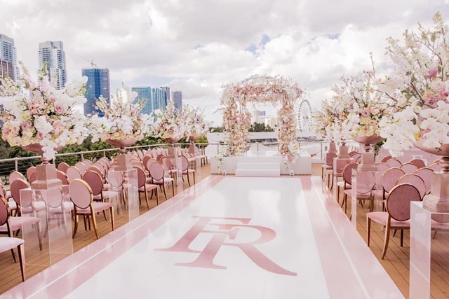 Reception setup on upper deck with skyline views