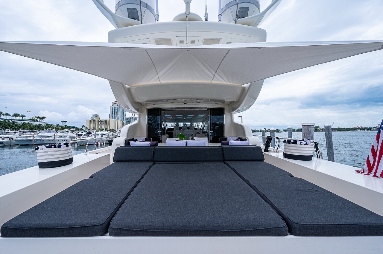 Leopard 98 ft - Bimini Charter 15 Foredeck cushions β skyline backdrop
