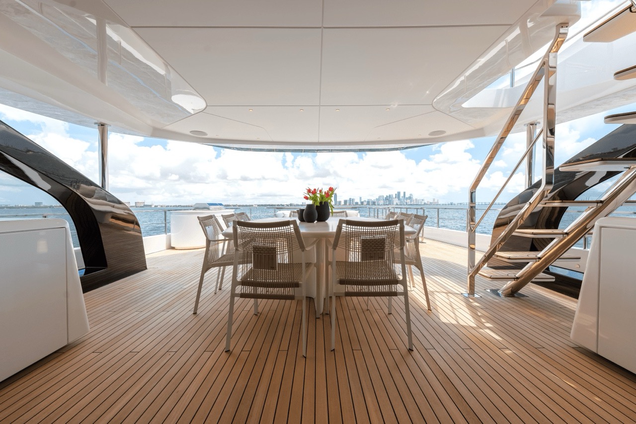 125 Azimut Grande 36 Metri (2025) - Bimini Charters 9 Aft deck dining table β teak